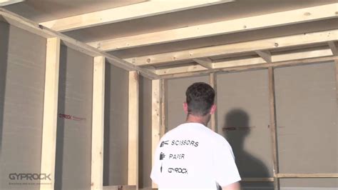 Installing Gyprock plasterboard.